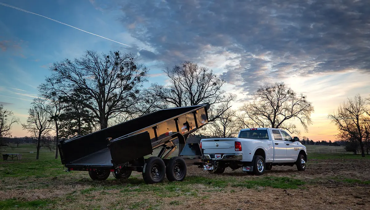 Wasatch Trailer Rental 14LP-14 dump trailer hitched to a truck